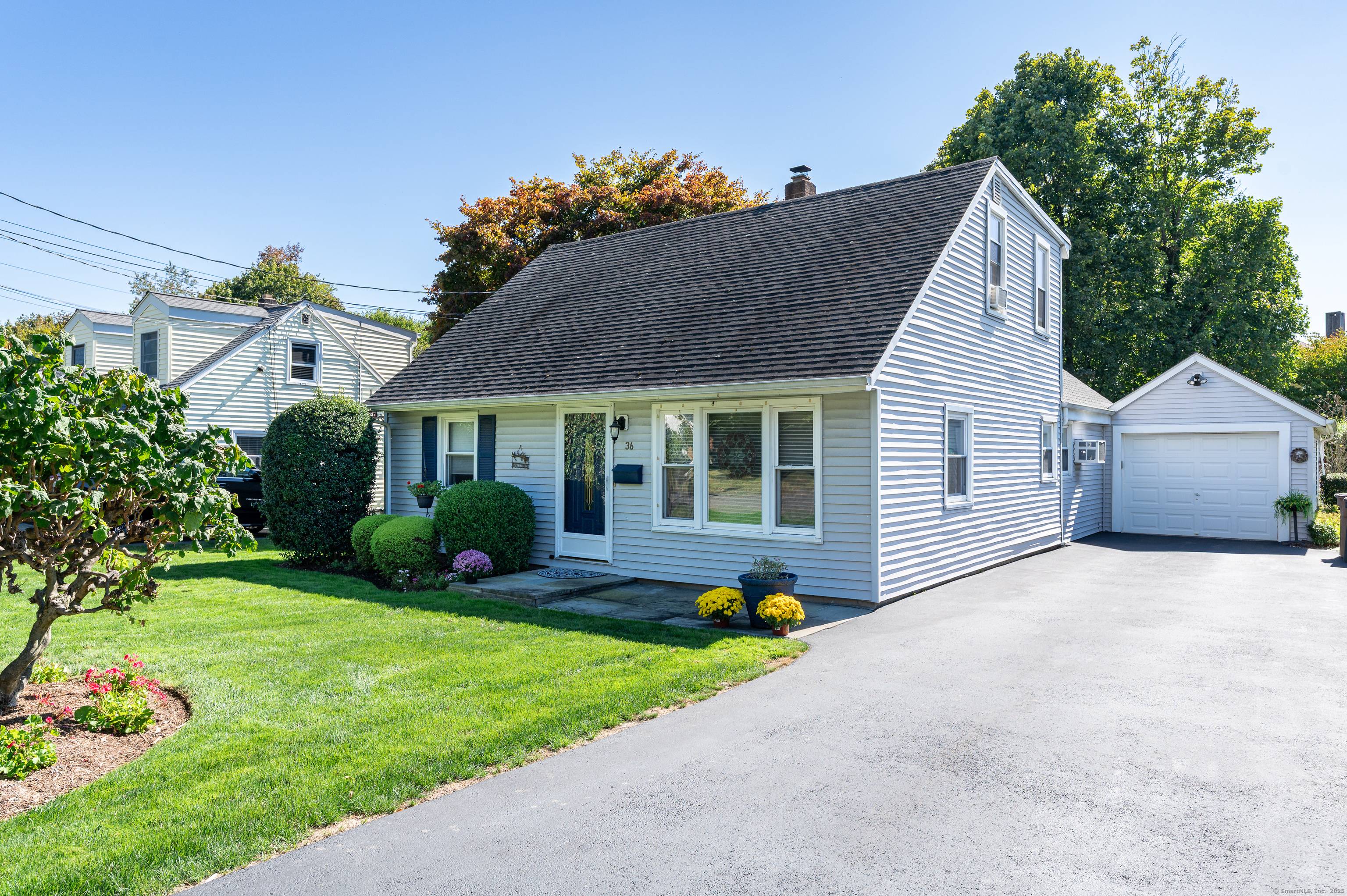 A charming 4 bedroom Cape Cod style home with an open floor plan.