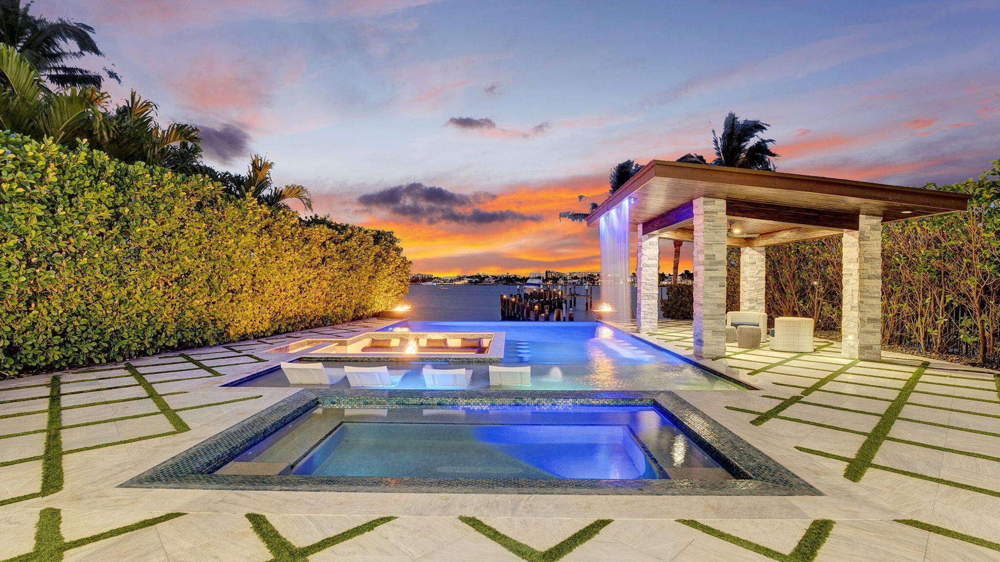 Luxury Waterfront Oasis An Entertainer's Dream HomeExperience the pinnacle of coastal luxury in this magnificent five bedroom, five bathroom estate, perfectly positioned along the Intracoastal Waterway with breathtaking views of ...