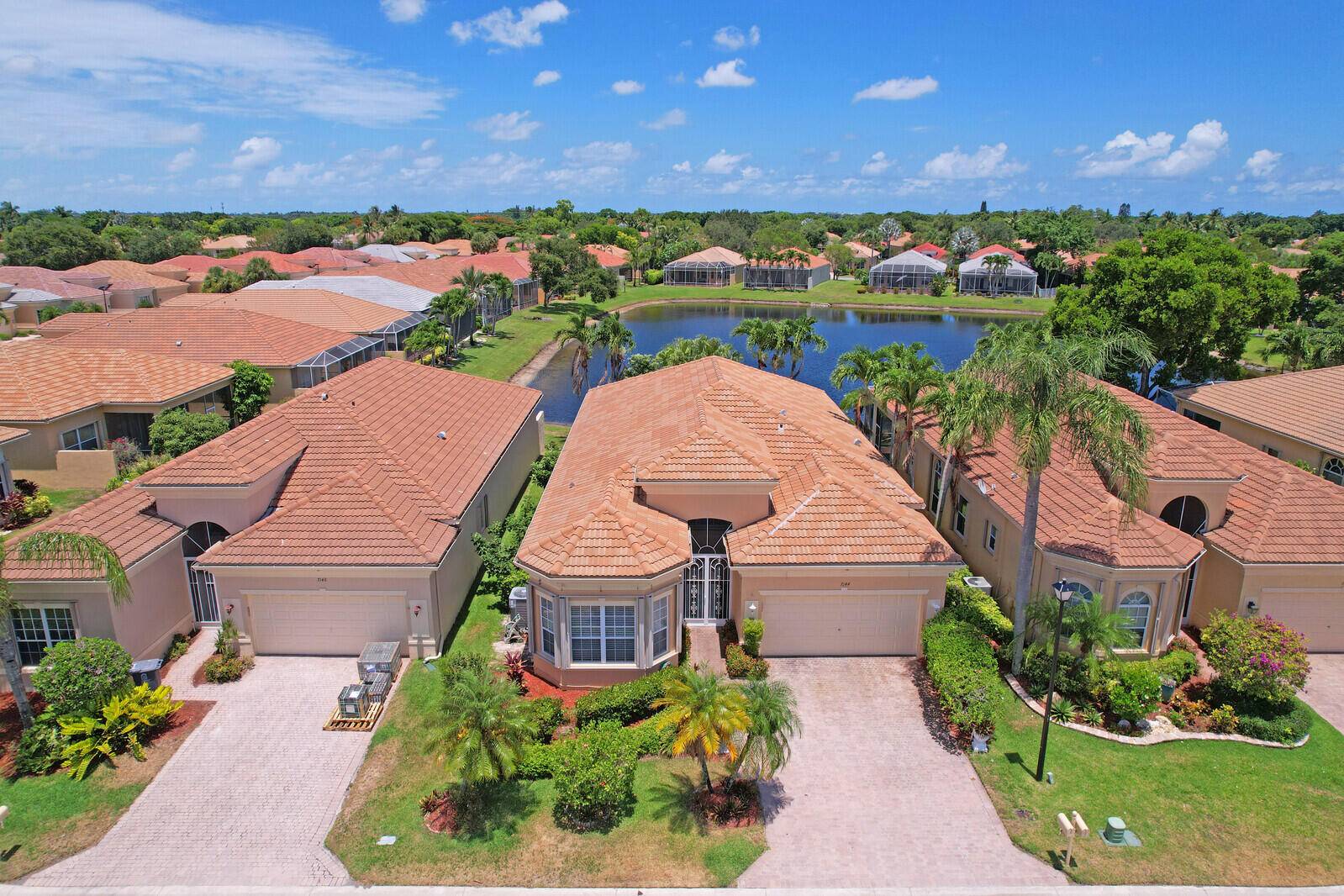 Welcome to the St. Michele Vizcaya's Largest Model with Stunning Lake ViewsThis beautifully maintained 3 bedroom with 3rd bedroom, currently utilized as a den, home is located in Vizcaya, a ...