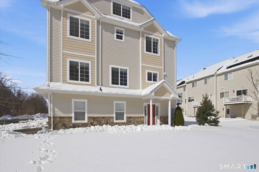 Don't miss this stunning, like new home in the popular South Windsor Woods community !