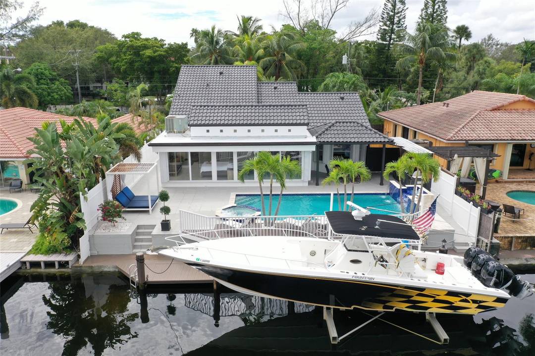 WOW ! ! FABULOUS REMODELED CONTEMPORARY 4 BEDROOM 4 BATH POOL HOME ON DEEP WATER UNRESTRICTED OCEAN ACCESS WATERWAY WITH NO FIXED BRIDGES.