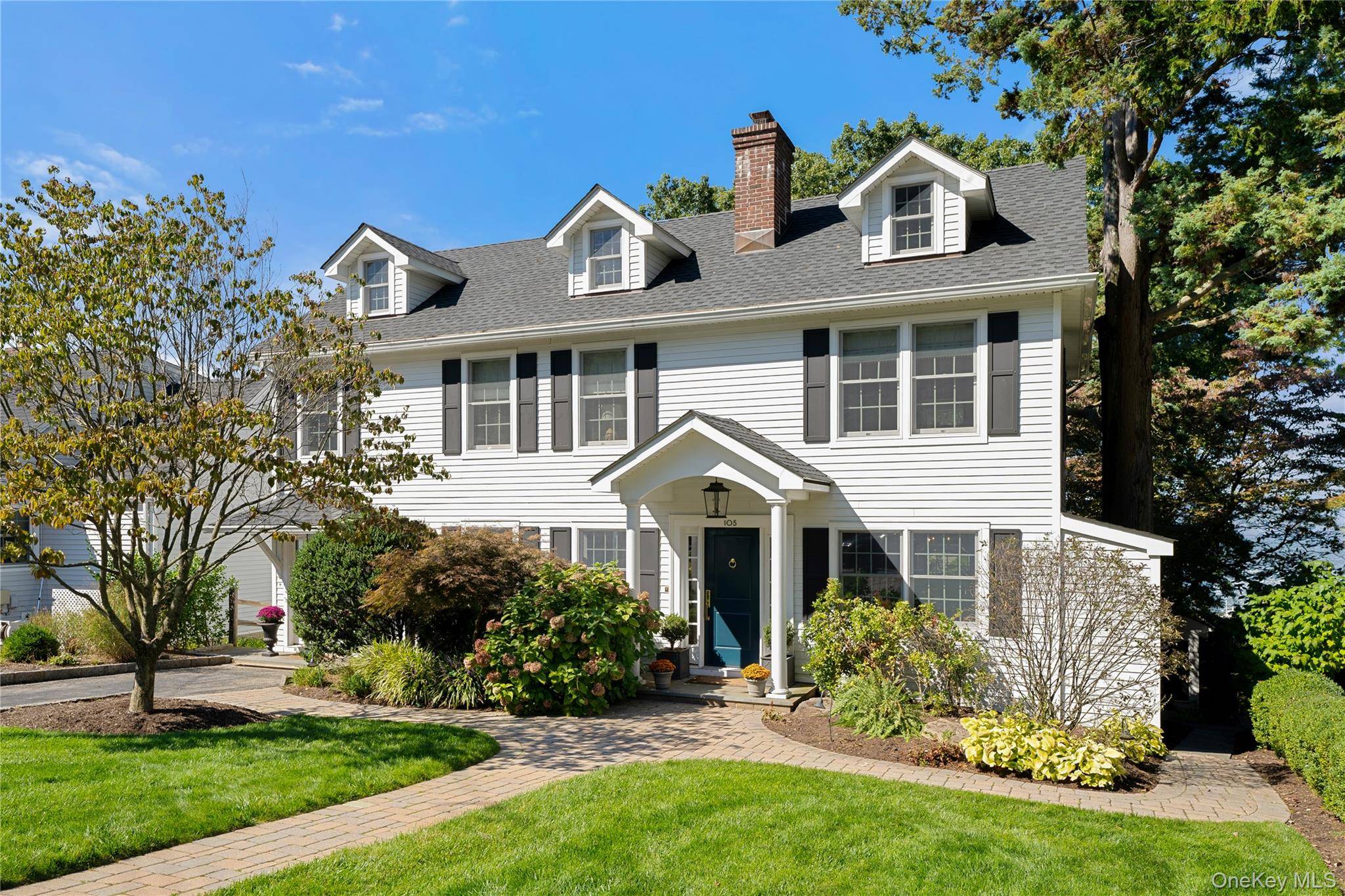 Perched majestically on the Hudson River with breathtaking panoramic water and bridge views from nearly every room, 105 Tappan Landing Road is an elegant and truly special home, blending timeless ...