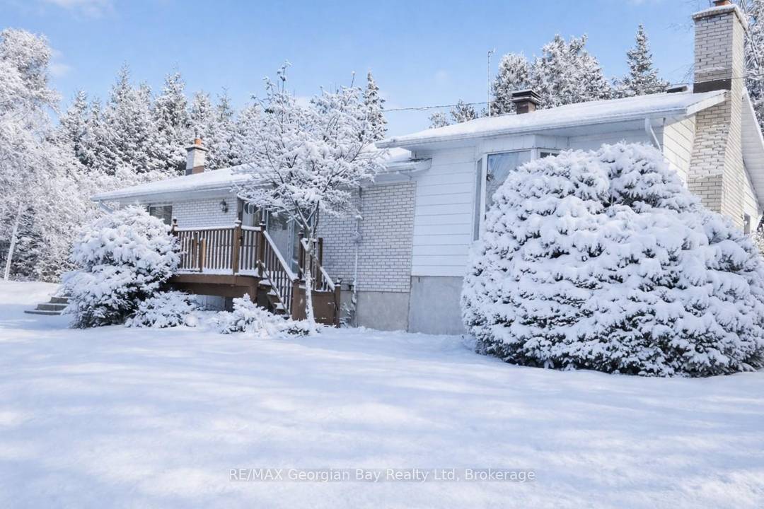 Privacy Plus ! Enjoy peaceful country living on this beautifully private, wooded lot with a ravine, offering nearly 2 acres of land.