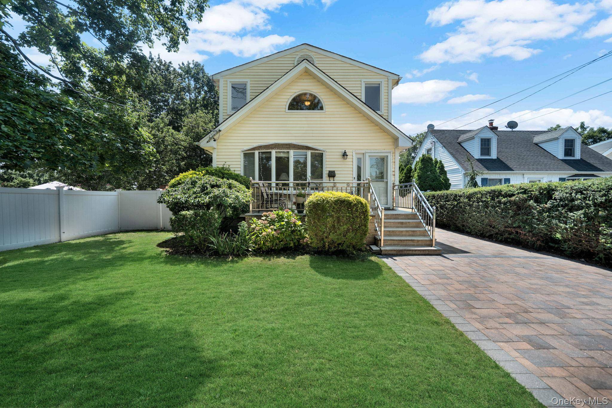 Nestled in one of Farmingdale s most sought after neighborhoods, this beautifully maintained 4 bedroom, 4 bath Colonial perfectly blends timeless character with thoughtful modern updates.
