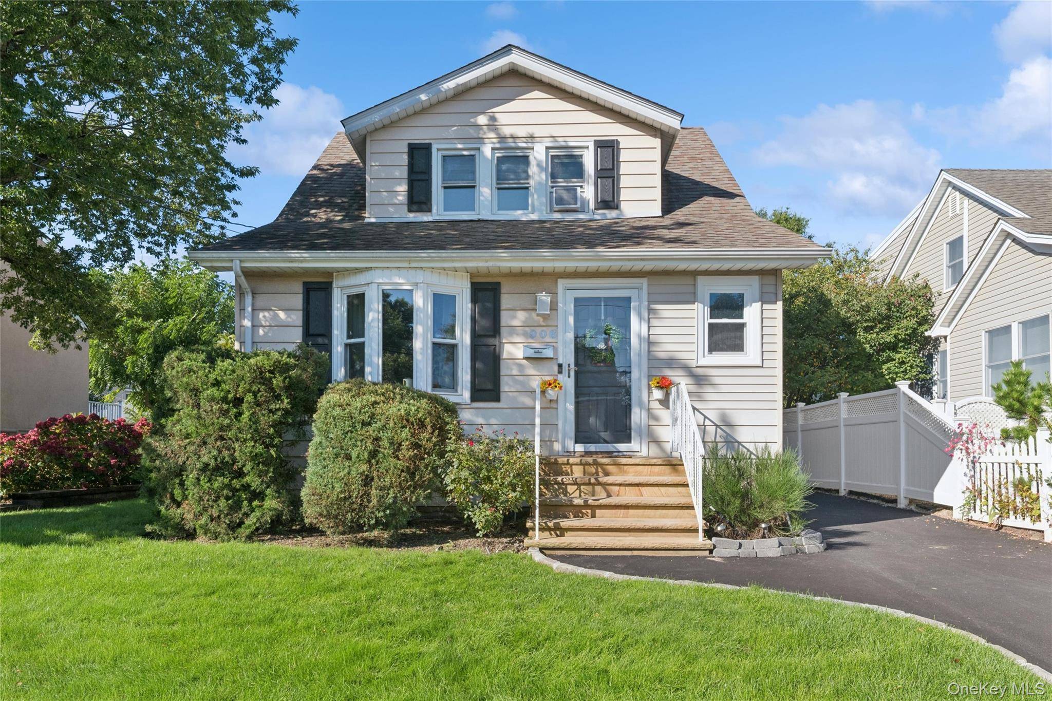 Welcome to 906 Ardmore Place a well maintained home on a quiet, tree lined street in the heart of Bellmore.