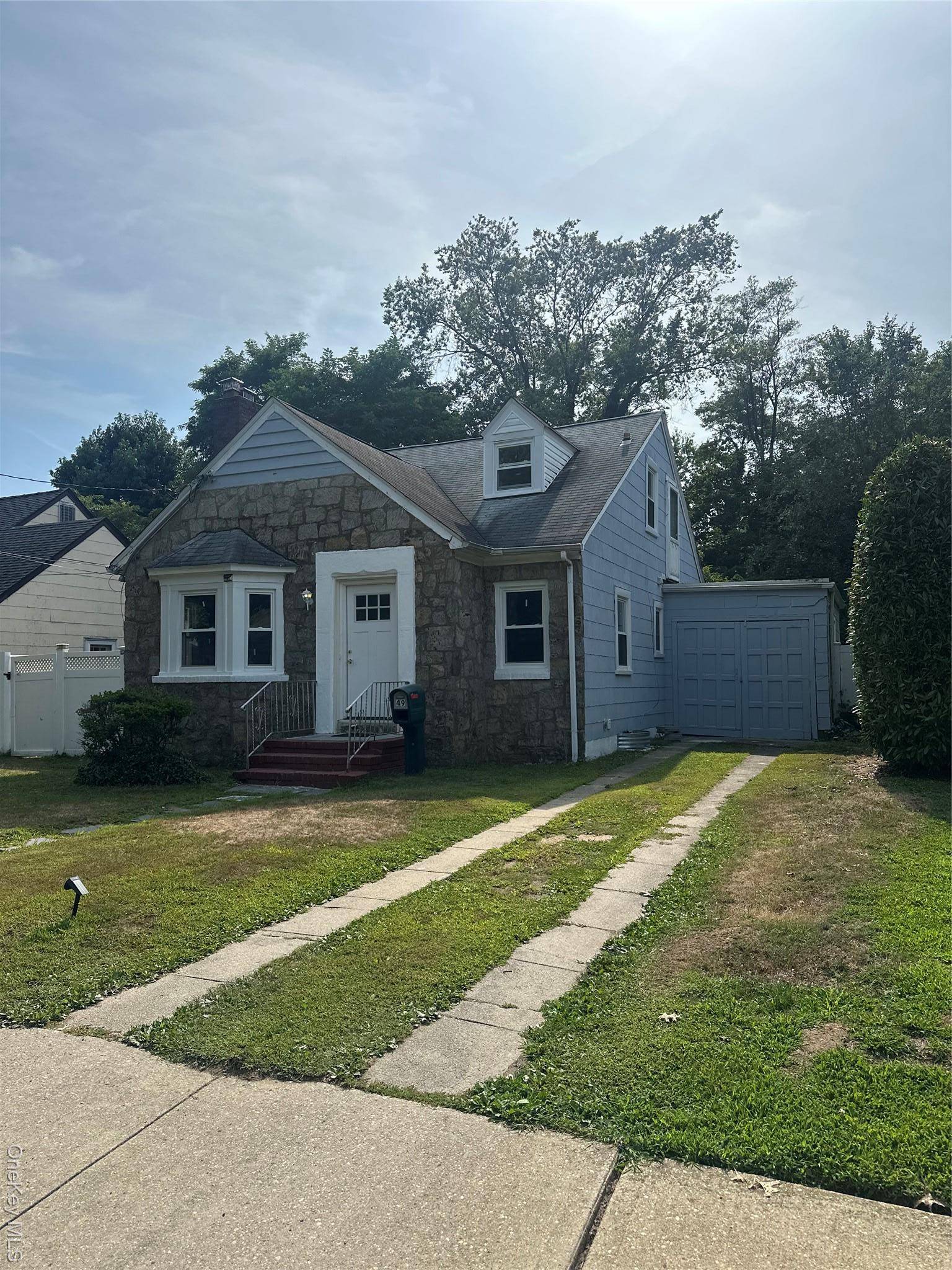 Welcome to this charming Cape style home nestled on a quiet cul de sac, offering timeless character combined with exciting recent upgrades.