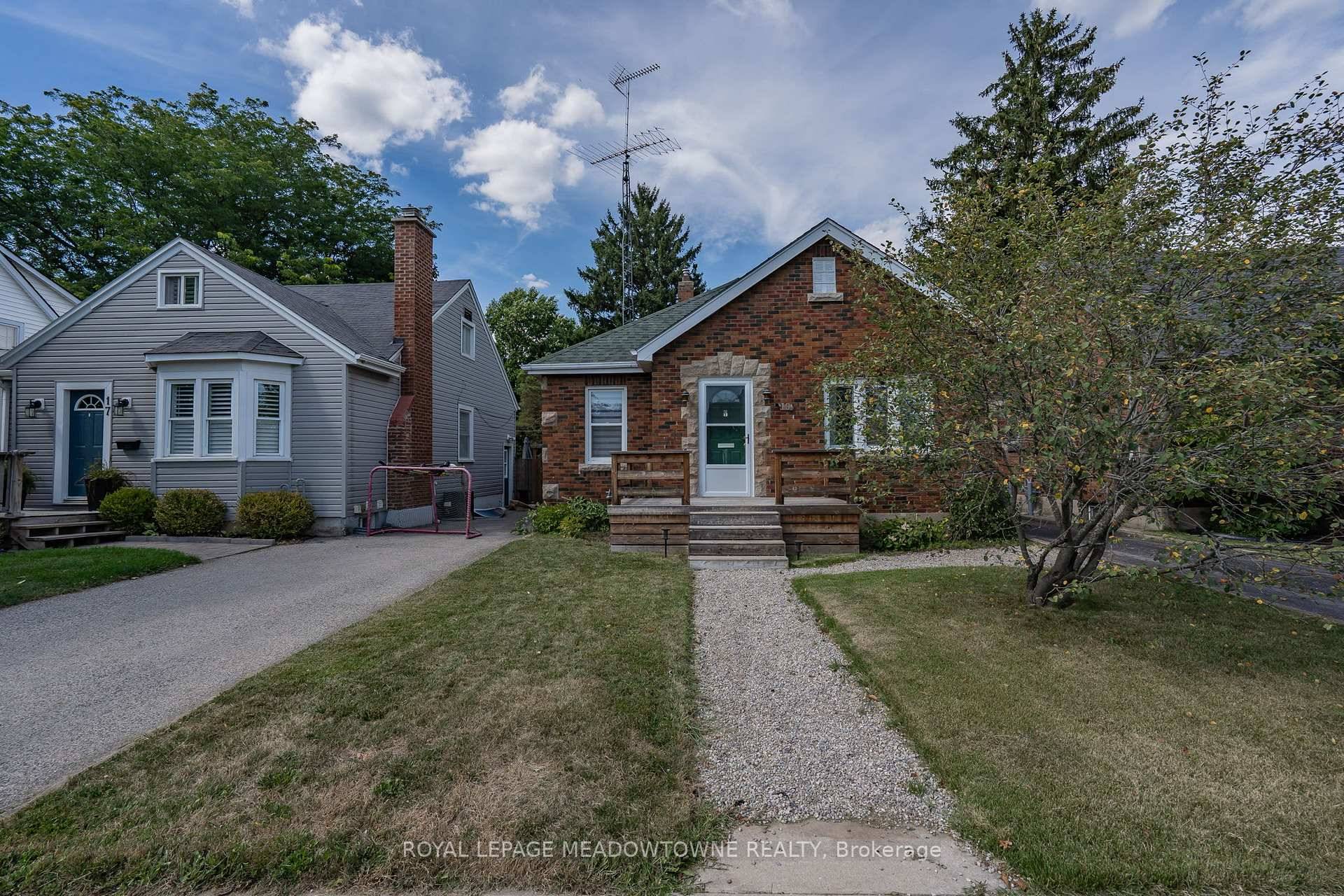 MOVE IN READY BUNGALOW WITH TWO KITCHENS, TWO LAUNDRY ROOMS AND CUSTOMS FINISHESWelcome to this beautiful and bright bungalow, perfectly situated in a highly desirable neighborhood with schools right across ...