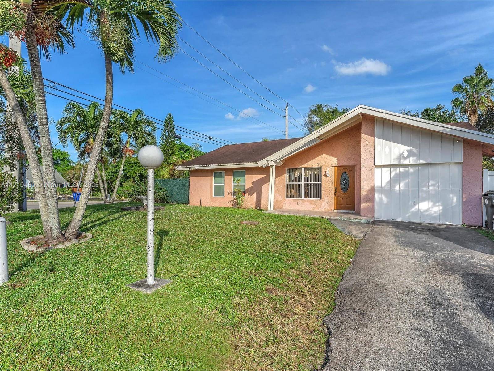 Discover the charm of this spacious pool home in North Lauderdale, great for creating your ideal living space.