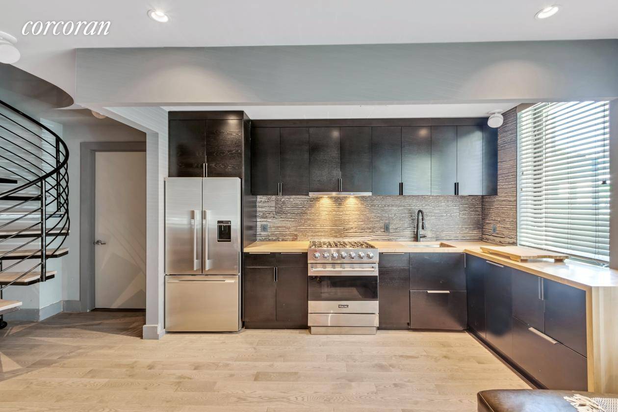 2 Bedroom Duplex with Separate Home Office featuring interiors custom designed by renowned design firm S.