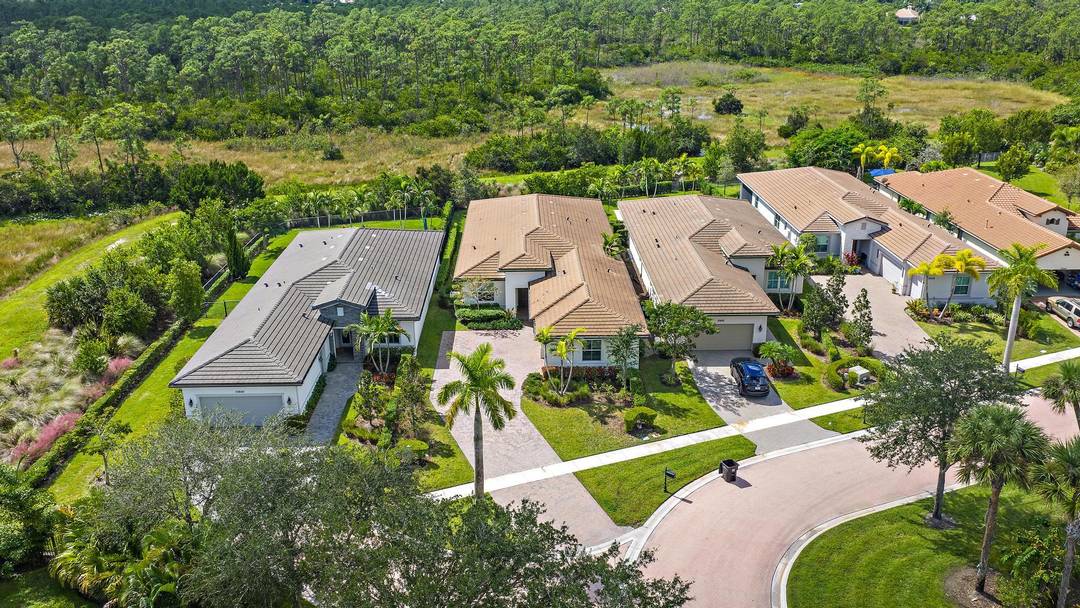 One of the newest homes in Ibis, this 2022 built Lennar ''Sparrow'' model enjoys a premium cul de sac location, an oversized yard, and pristine views of the nature preserve.