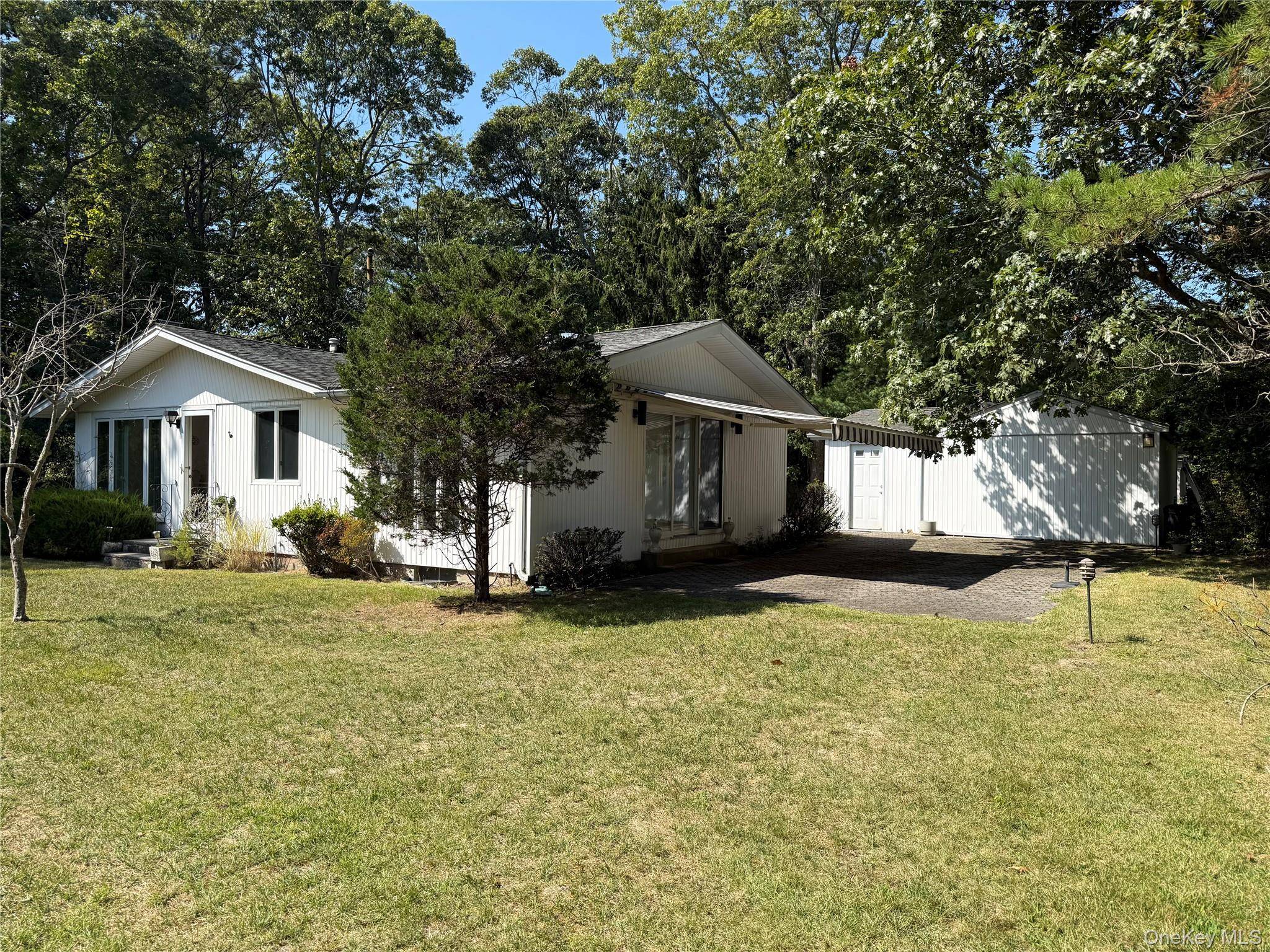 Well Maintained, very private move in Ready Ranch located in desirable location in Hampton Bays, Town of Southampton.