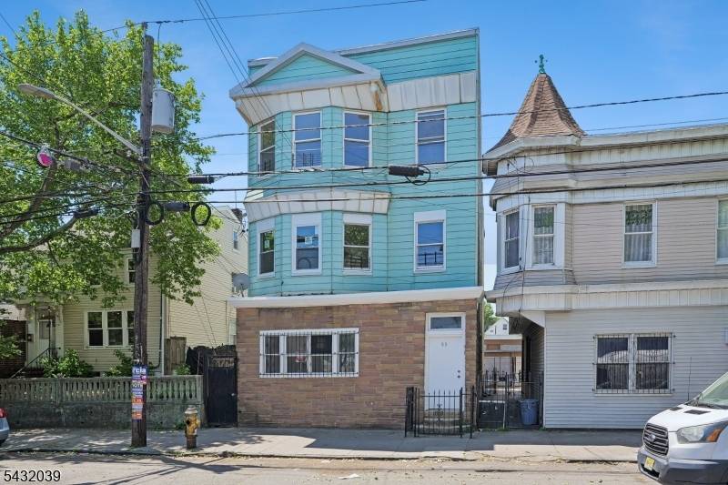 Rare Opportunity in the Ironbound Section of Newark, 3 family delivered vacant, offering endless potential for investors or owner occupants, featuring new plumbing and electric, separate utilities, finished basement with ...