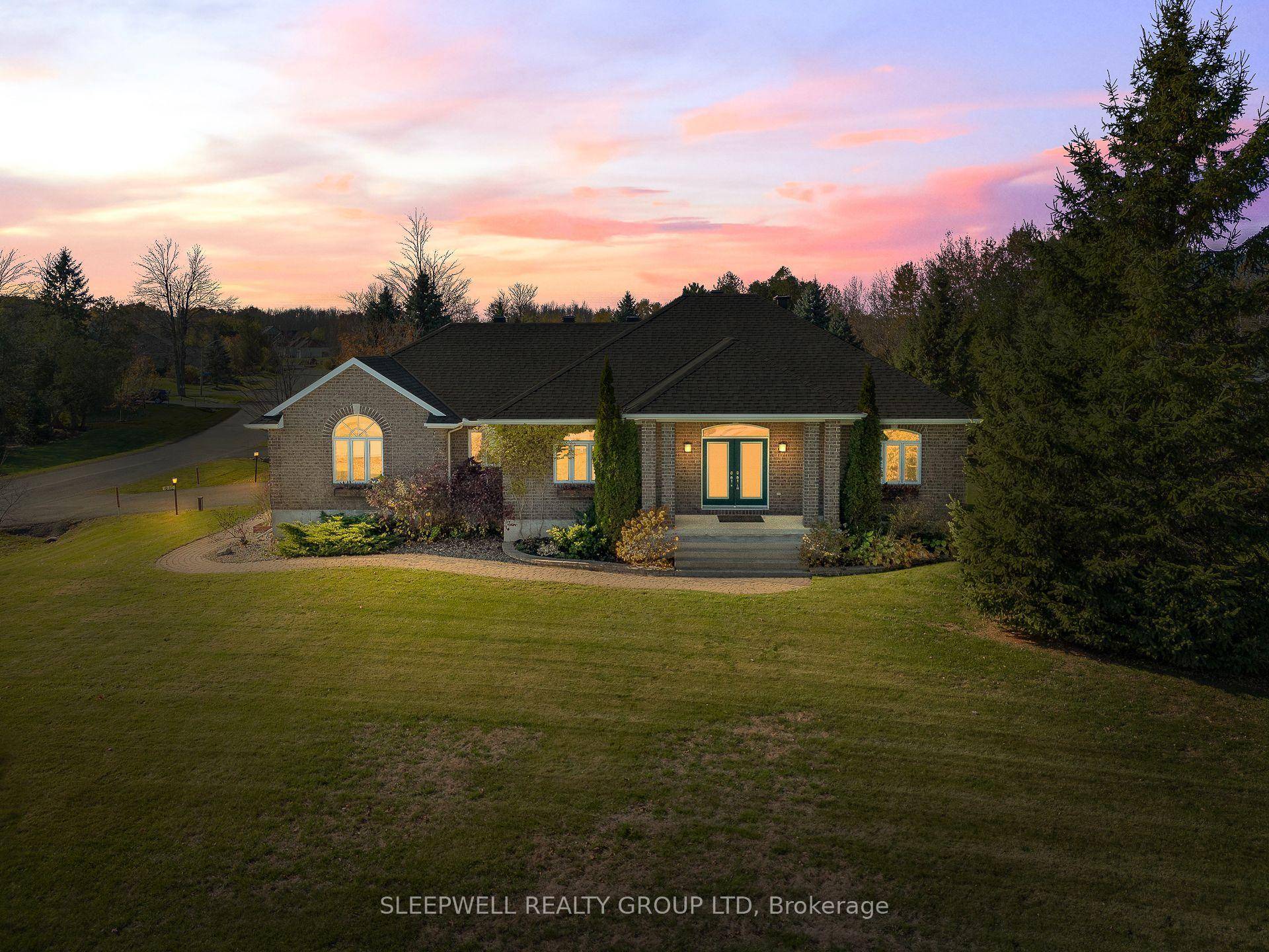 Welcome to 1040 Misty Morning Lane, a beautifully maintained bungalow in the highly sought after Sunset Lakes community in Greely.