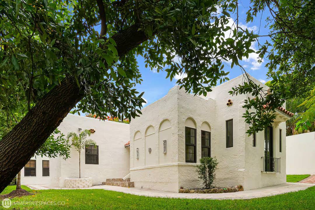 This 1926 Spanish Mission style home, in Historic Northwood Hills, offers the perfect fusion of timeless charm and modern convenience set on a double lot.