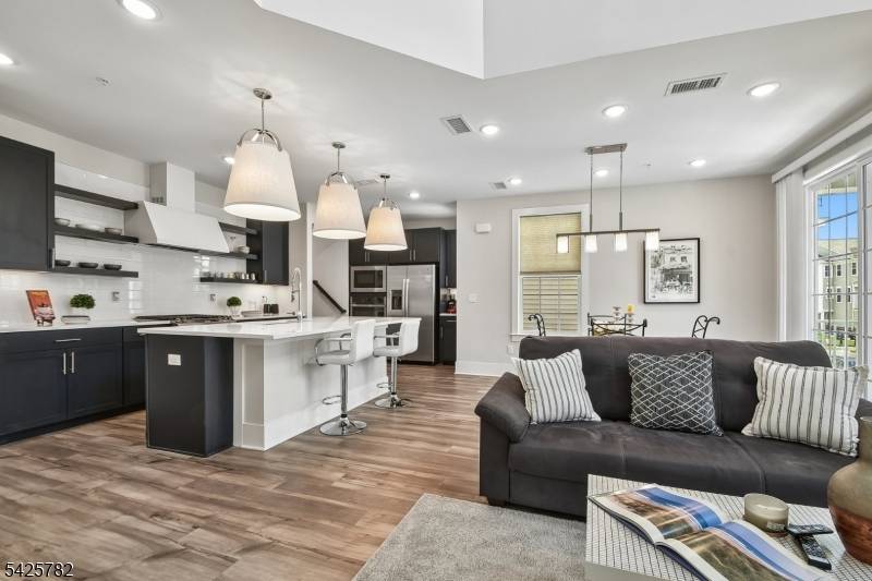 Luxury Townhome Living Modern Comfort Connectivity in sought after Dunellen Crossings !