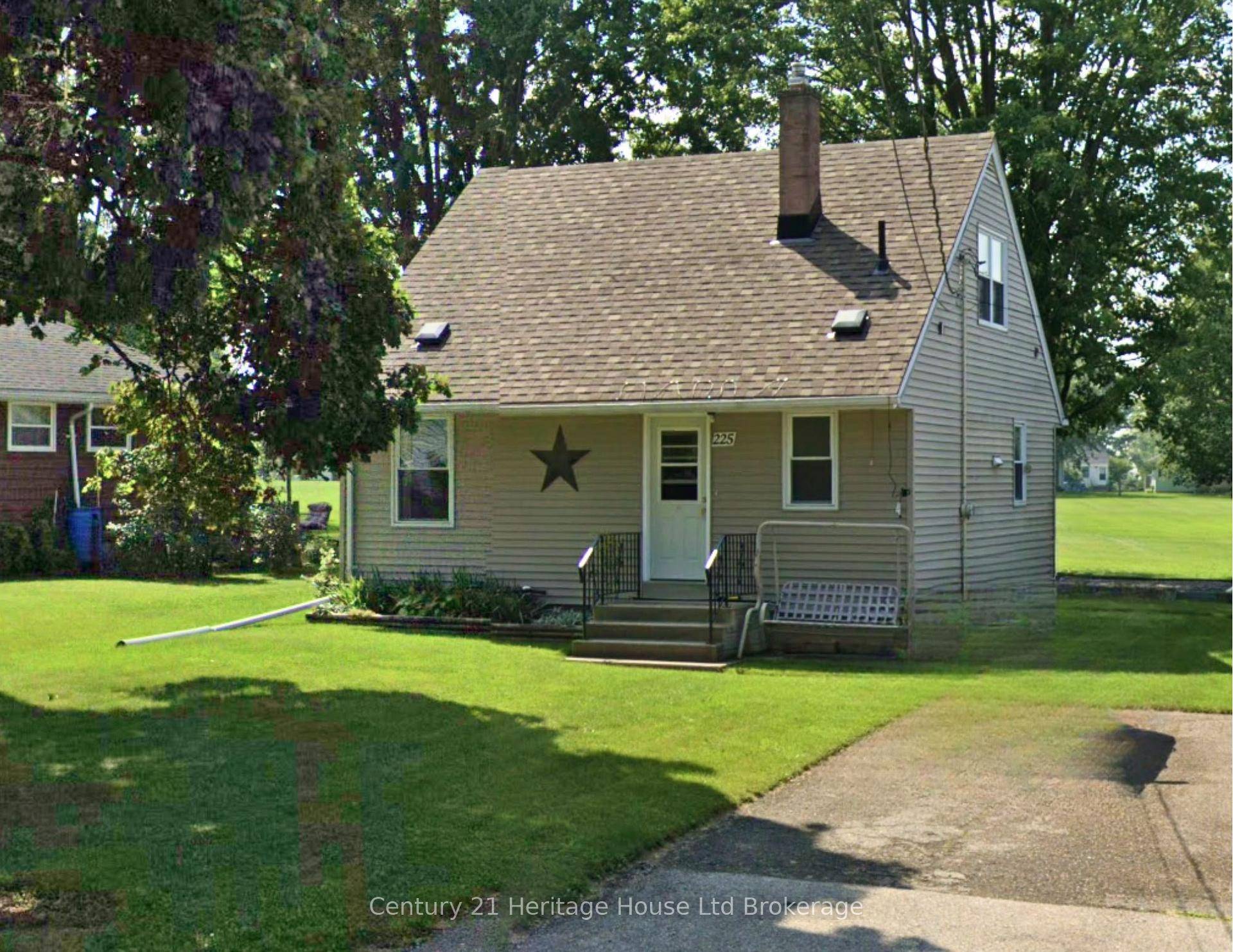 Charming amp ; Affordable Home in a Park Like Setting !