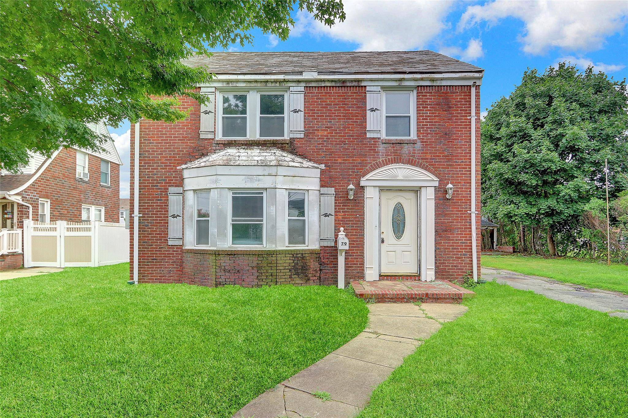 Colonial Style Home. This Home Features 3 Bedrooms, 1.