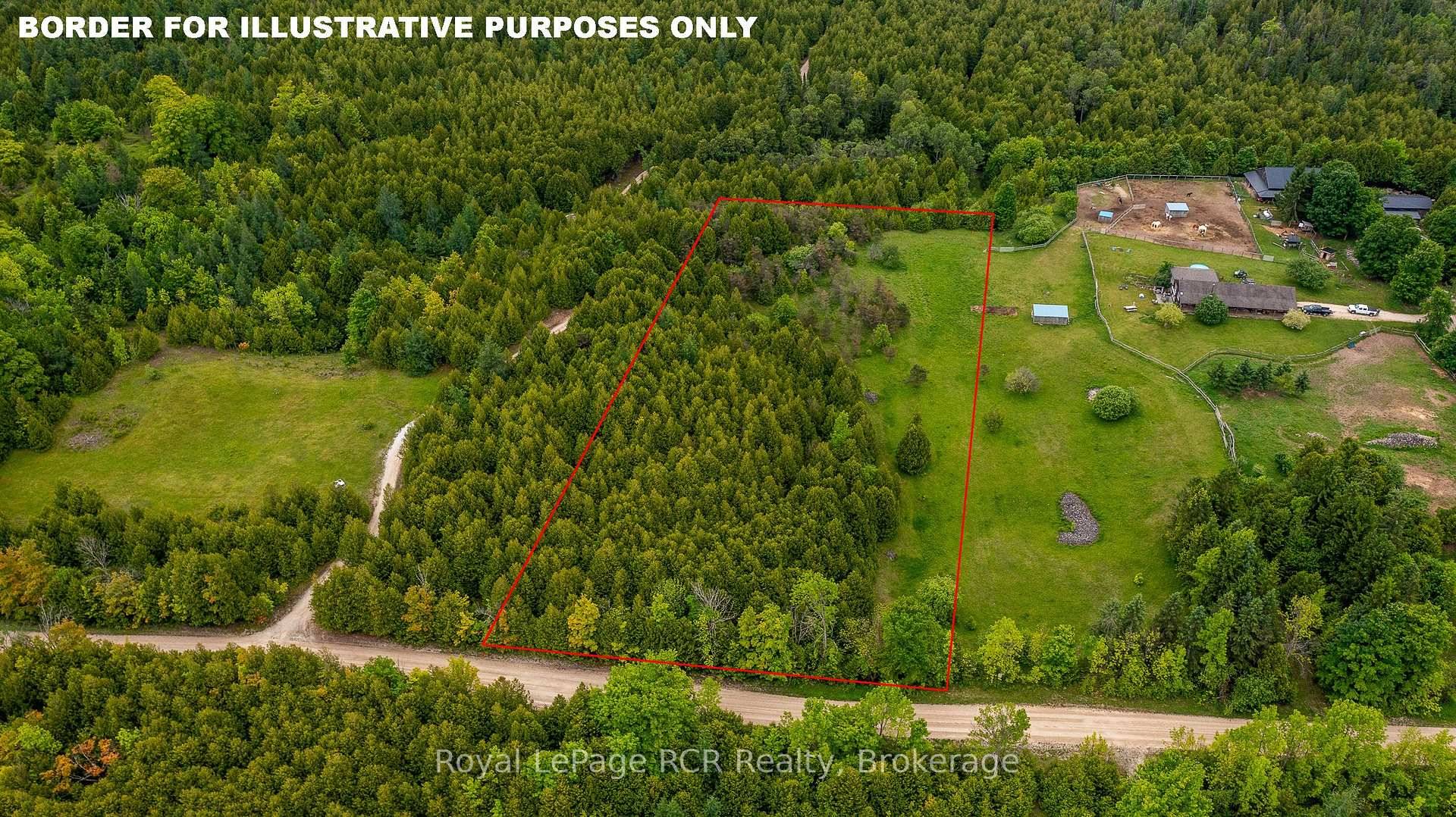 Beautiful 3 acre building lot, perfectly nestled among mature pine and cedar trees with the balance in gently rolling pasture land.