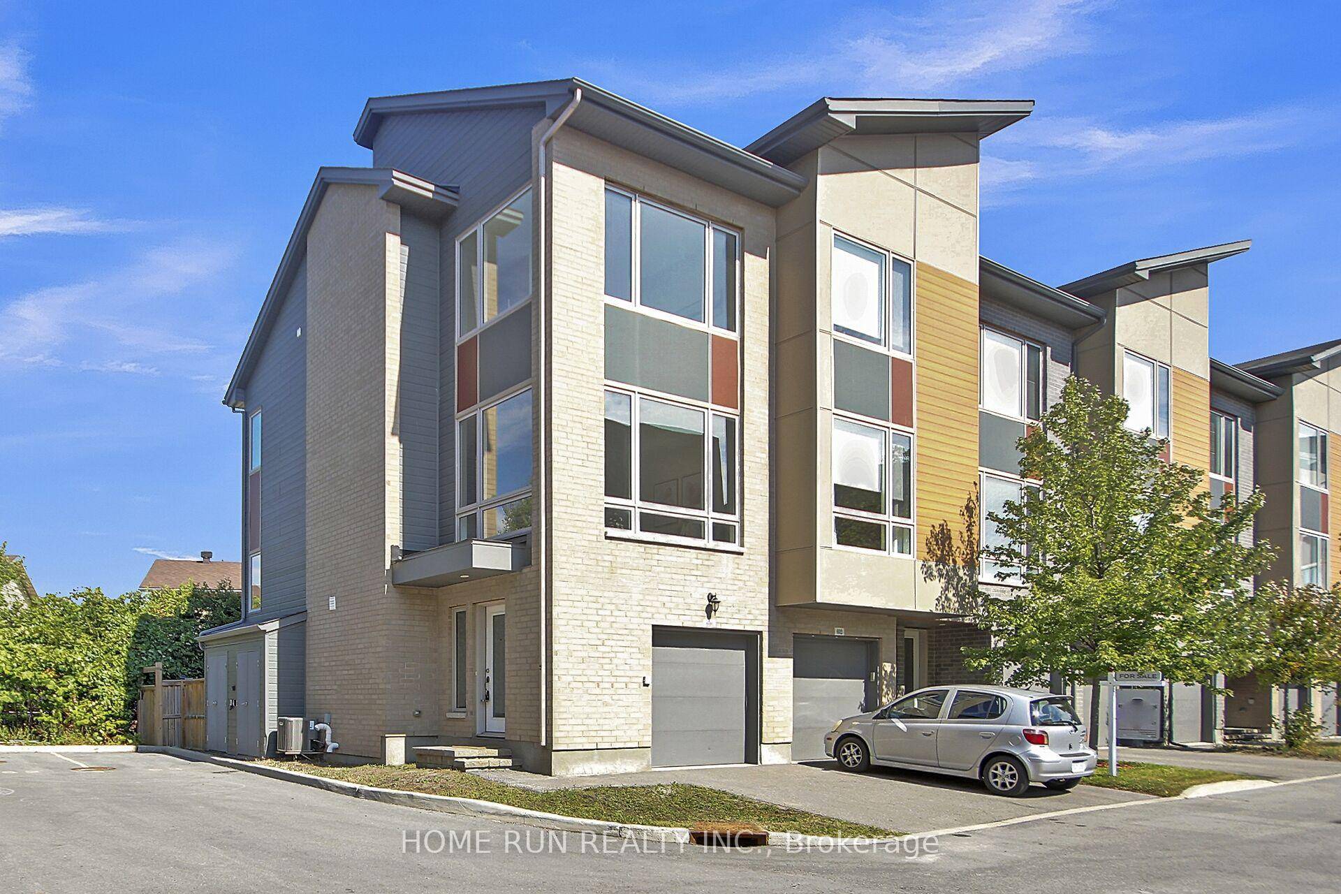 Welcome to this beautiful 3 storey freehold CORNER unit townhome with 2 1 bedroom and 3.
