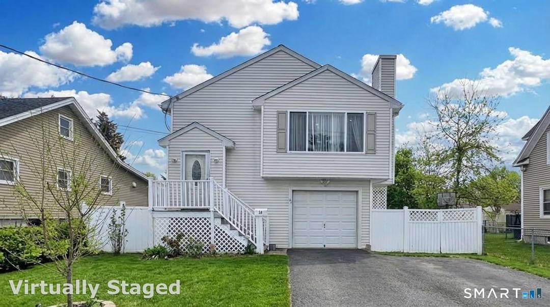 Beautifully Maintained Home with walk out lower level, possible in law Move In Ready !