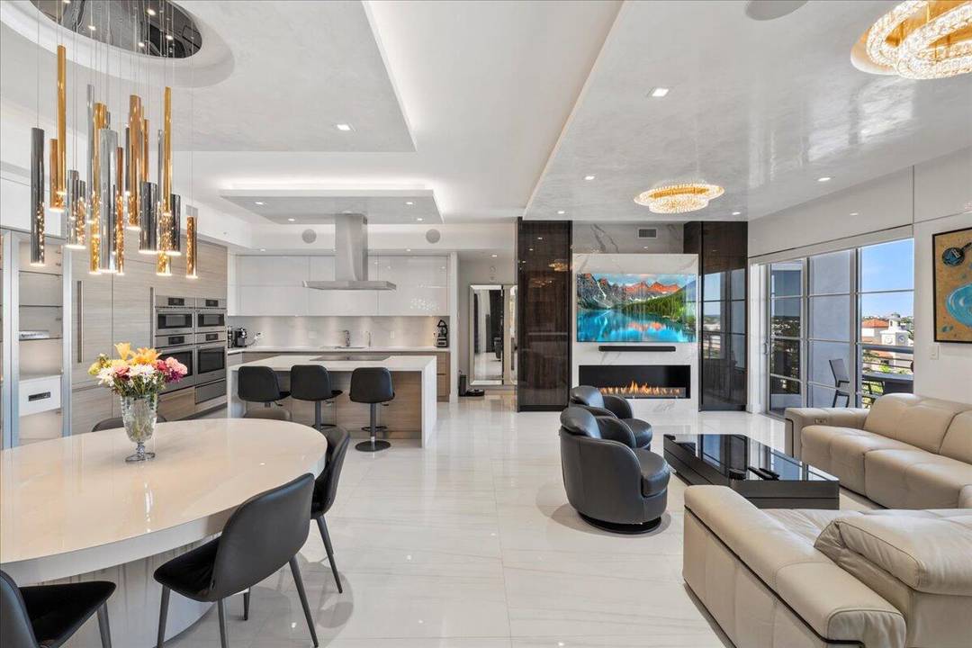 Experience the pinnacle of luxurious urban living in the heart of downtown Boca Raton with this impeccably crafted residence, completed in the summer of 2020.