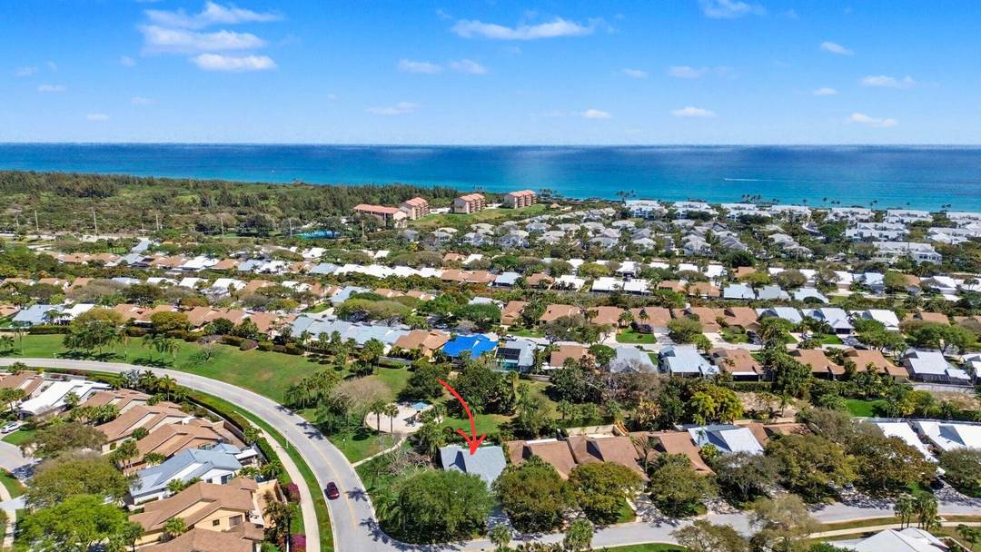 Fully renovated pool home in the highly sought after Ridge at the Bluffs just a short stroll to the beach.