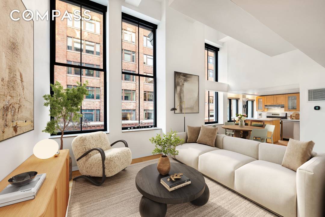 Welcome to this exquisite one bedroom, one bathroom condo situated at 421 Hudson St the famous Printing House boasts high ceilings and architectural built ins, creating a luxurious living space.
