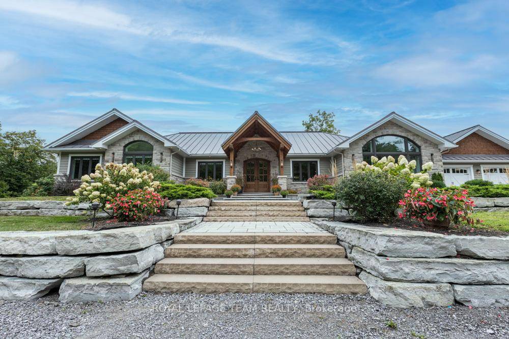 ICF Construction ! This stunning 8 bedroom luxury residence is set on 12 acres of breathtakingly private countryside.