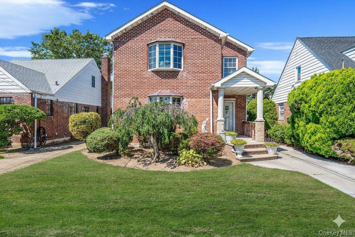 Welcome to this modern two story brick home offering space, style, and flexibility.