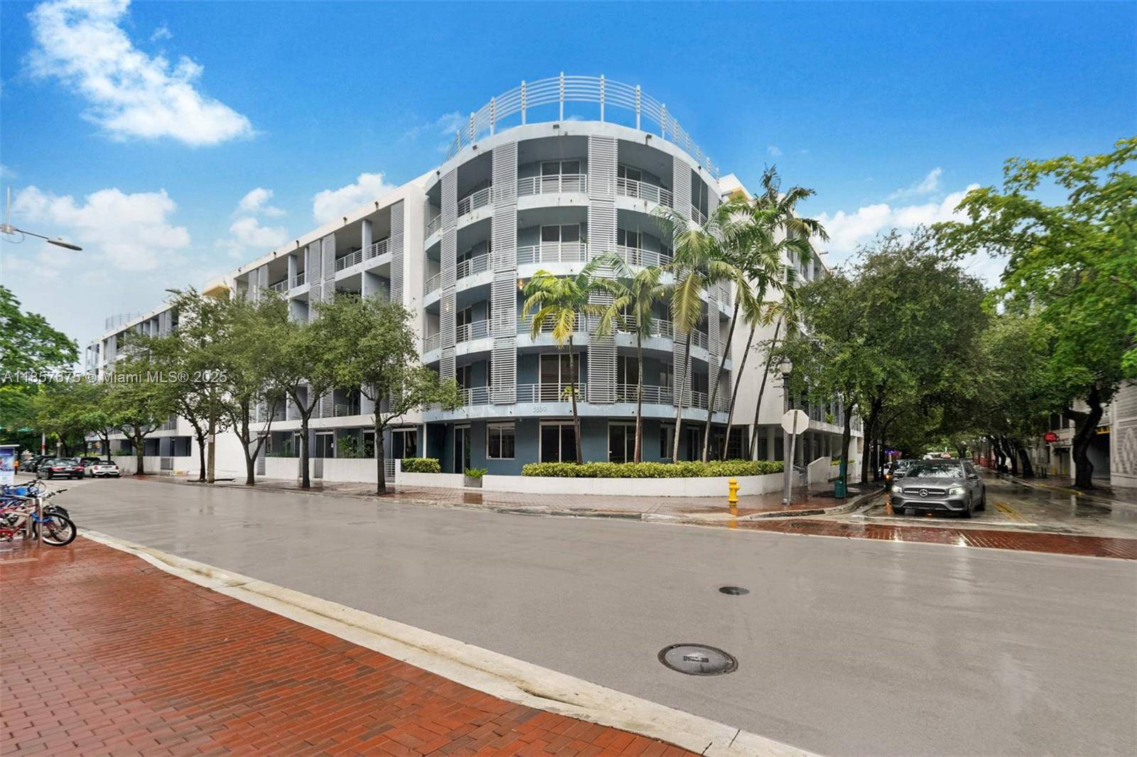 Live in the vibrant heart of Coconut Grove in this rarely available corner residence at the Lofts at Mayfair.