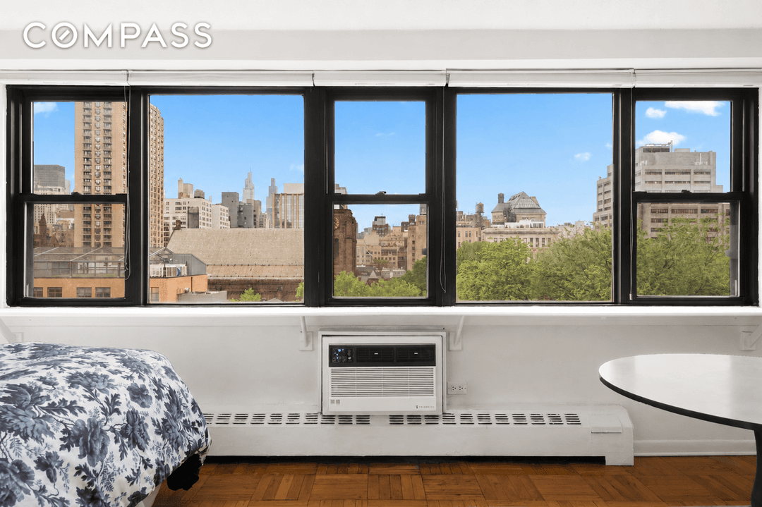Welcome home to this sun drenched alcove studio with sweeping, unobstructed views overlooking Stuyvesant Square Park.