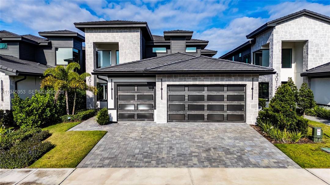 Welcome to this elegantly appointed residence, located in the exclusive gated community of Hampton Green at Providence.