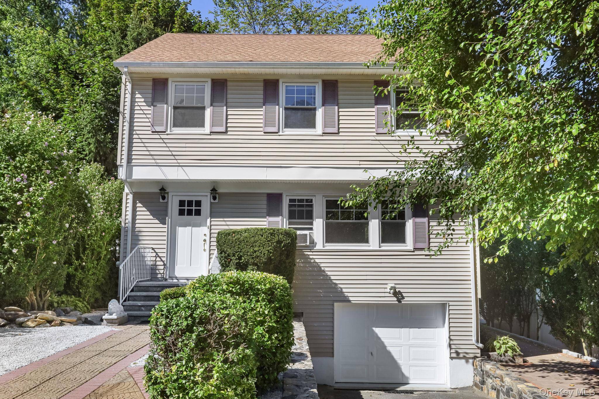 Welcome to this delightful Colonial style home located on a peaceful residential street.