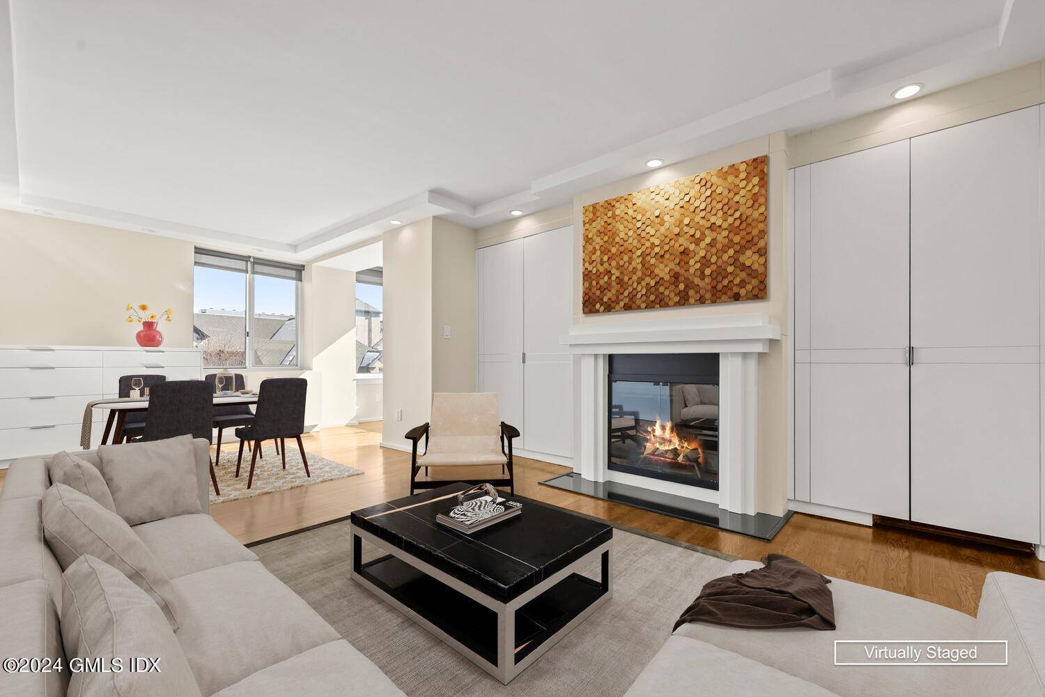 Elegant sunny corner unit with 2 bedrooms and 2 large bathrooms, plus laundry and wood burning fireplace.