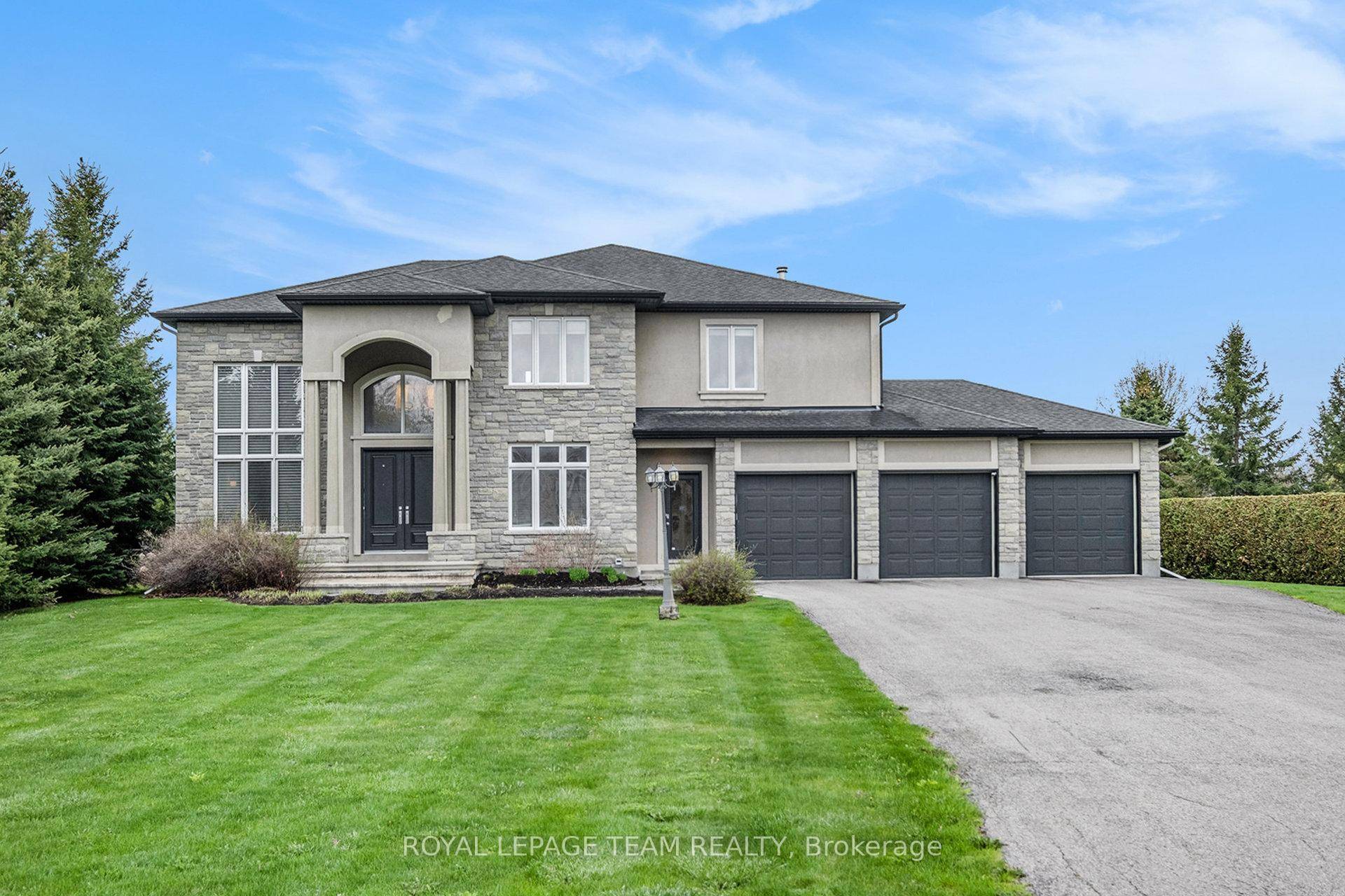 Stunning custom built home situated on a premium corner lot within a highly desirable neighborhood.