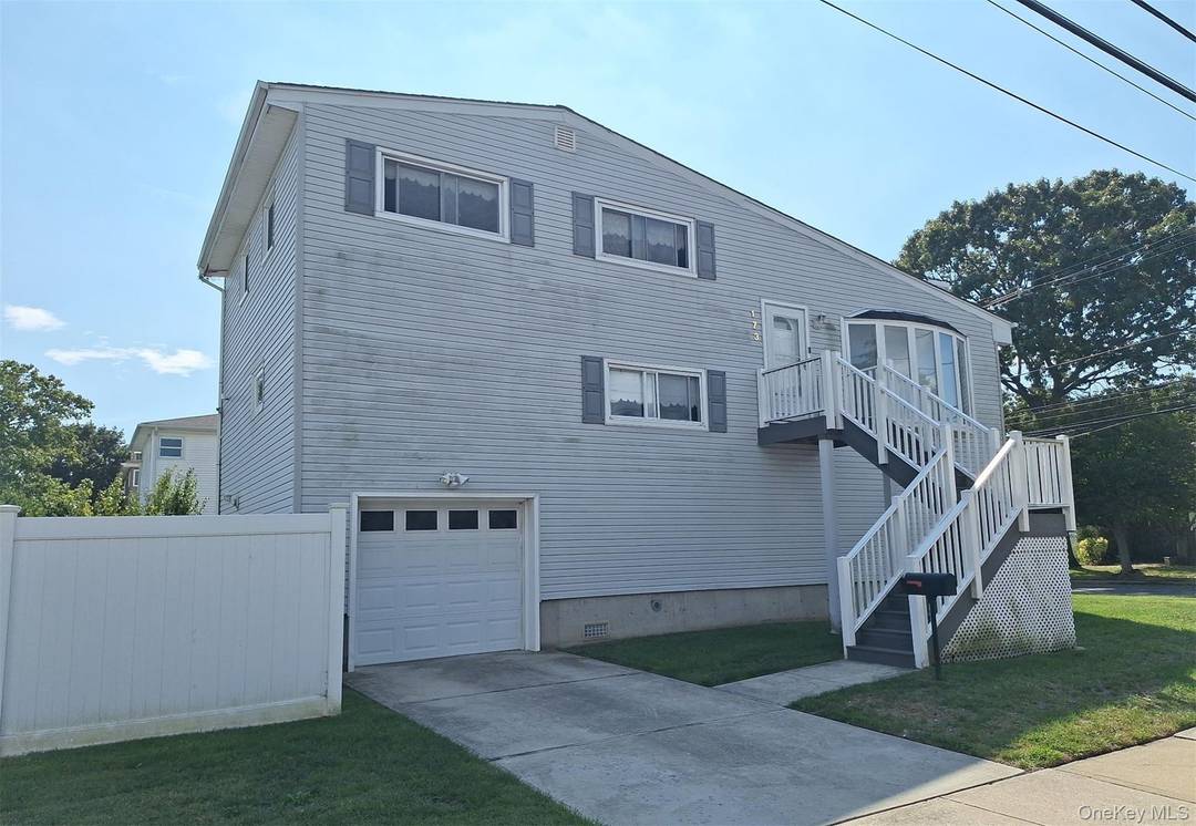 This Split Level Style Home Features 3 Bedrooms, 1.