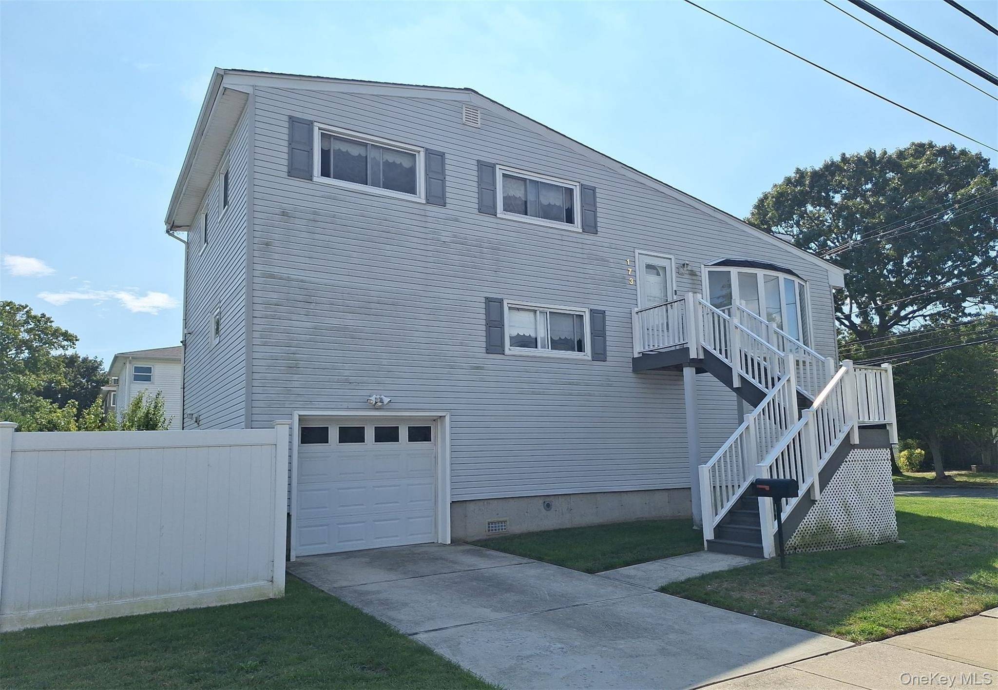 This Split Level Style Home Features 3 Bedrooms, 1.