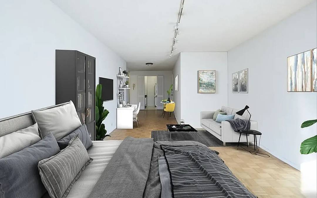 Welcome to this spacious alcove studio in the reputed Fifth Avenue Tower Condominium !