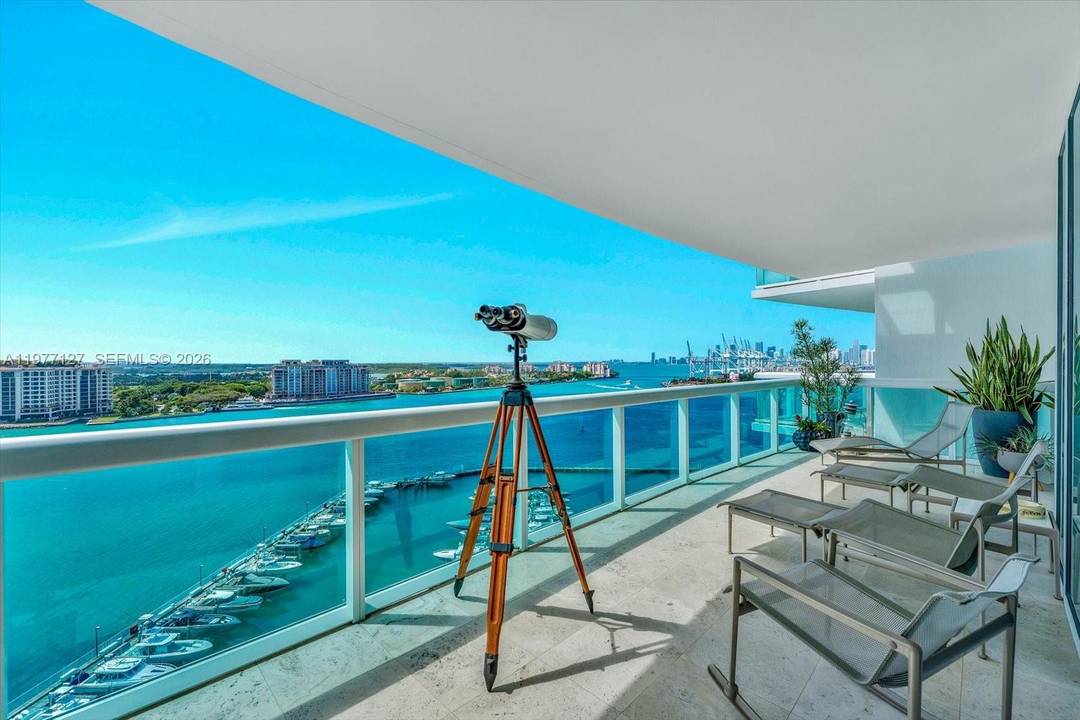 Experience refined coastal living in this exquisitely renovated 15th floor flow through residence at Miami Beach s premier waterfront address, Murano at Portofino.