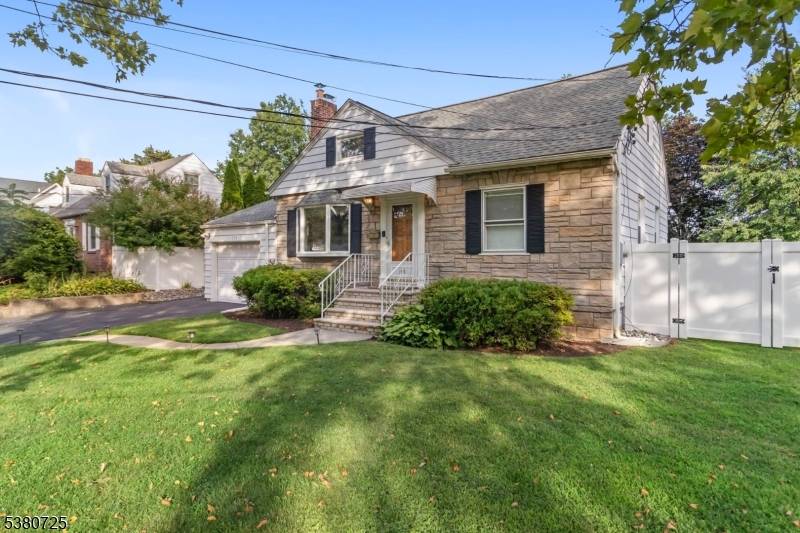 Welcome to this beautifully updated 4 bedroom Cape Cod in the heart of Springfield, NJ !