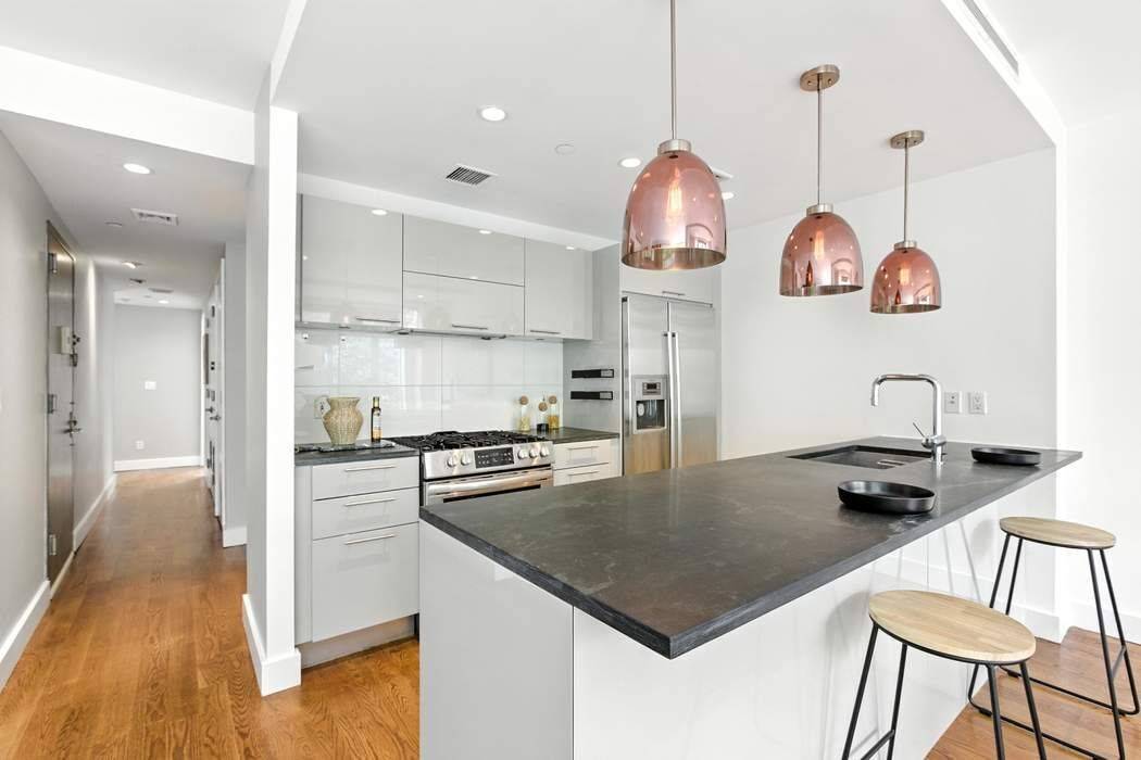 This condo offers everything you could want in a two bedroom, two bathroom apartment in Williamsburg.