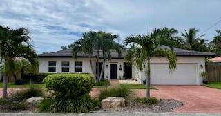 Charming and fully updated 2 bedroom, 2 bath single family home in Bel Marra, East Boca Raton.