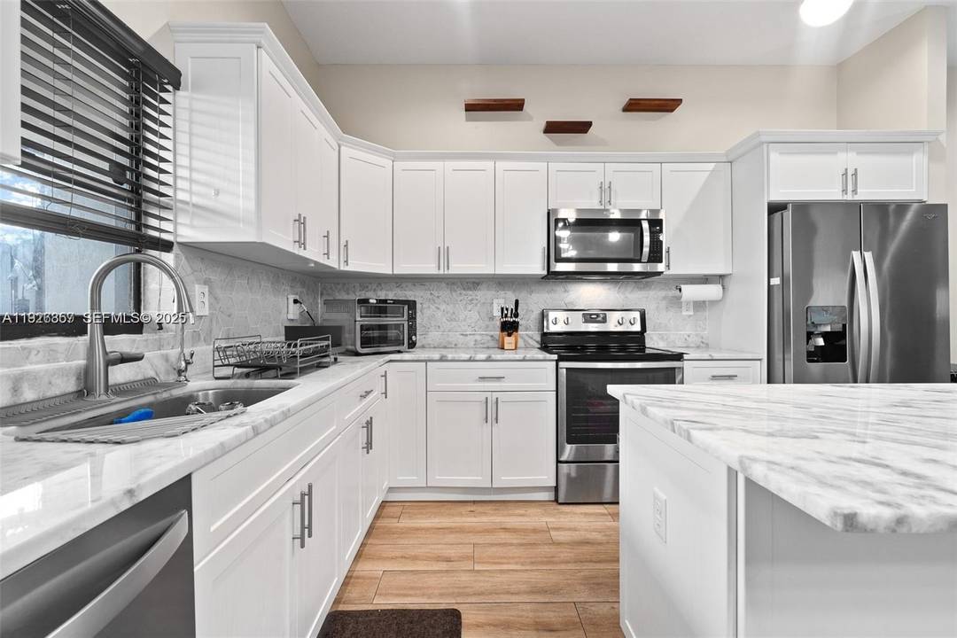 This stunning pet friendly townhouse built in 2020 offers upscale living with premium upgrades throughout.