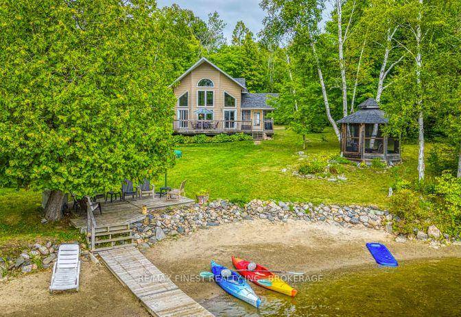 KENNEBEC LAKE This immaculate, custom built home or four season cottage is turn key and ready for you to enjoy !
