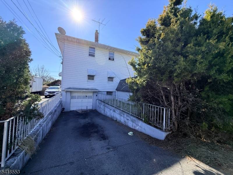 Great two family home featuring a living room, eat in kitchen, two bedrooms, and a bathroom on each floor.