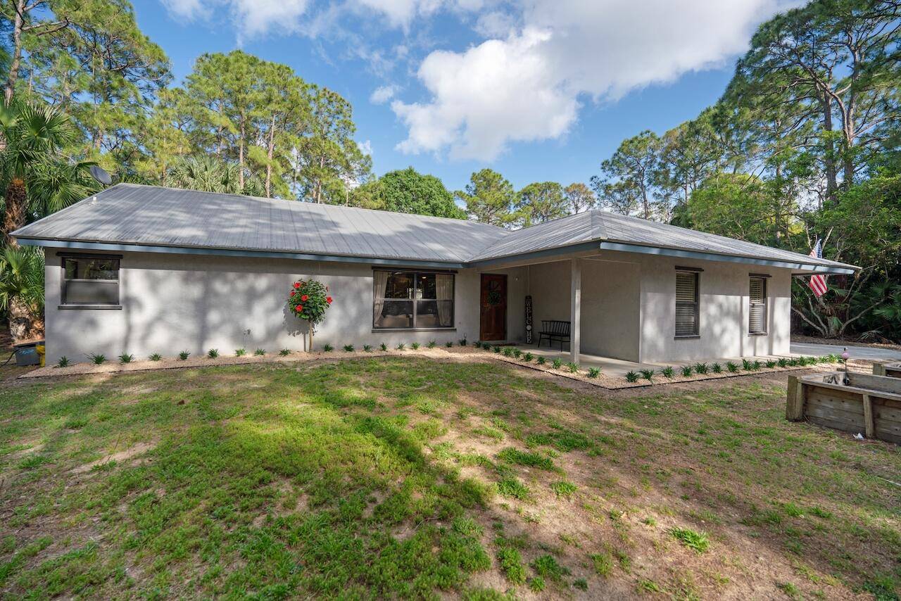 Beautifully updated CBS home with Bonus Detached 1500 sqft workshop.