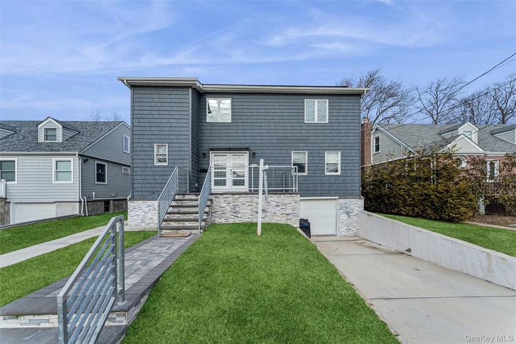 Expanded in 2021 this spacious open layout Colonial in Hewlett School District 14 is on the market for the first time.