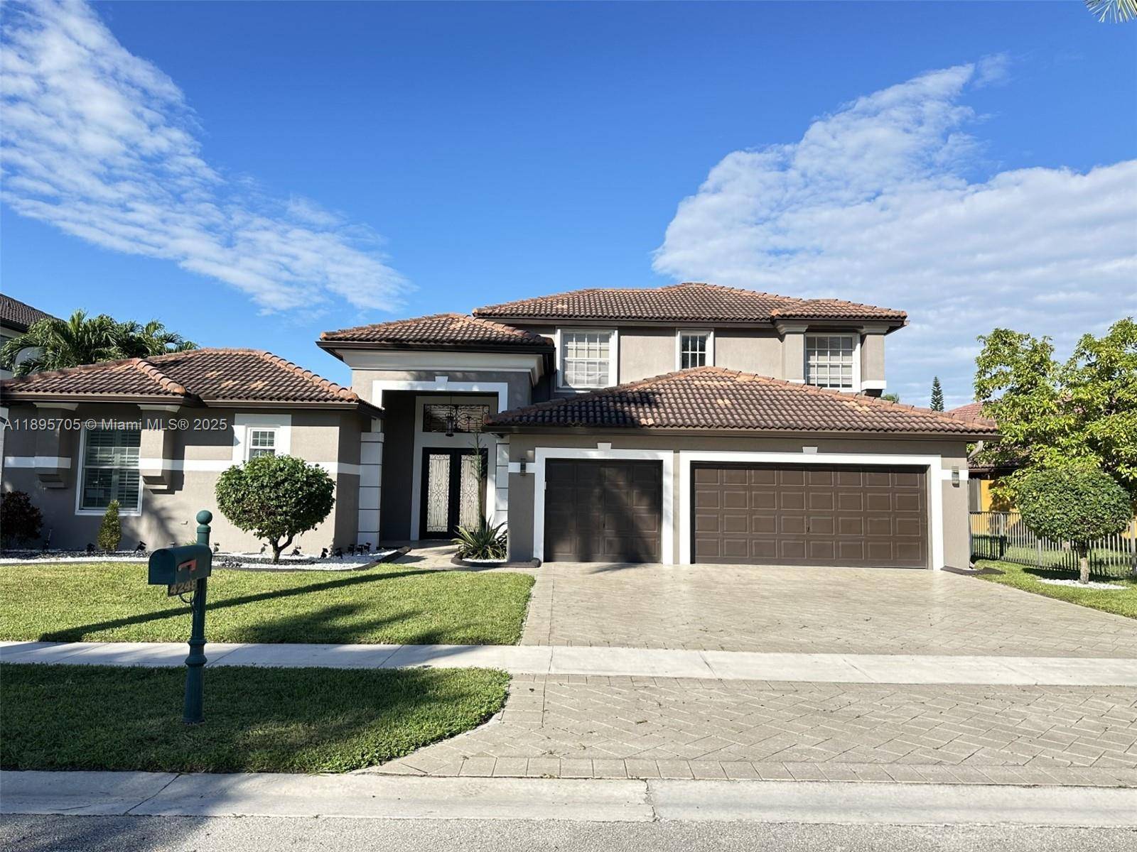 Stunning home in the sought after Sunset Lakes community.