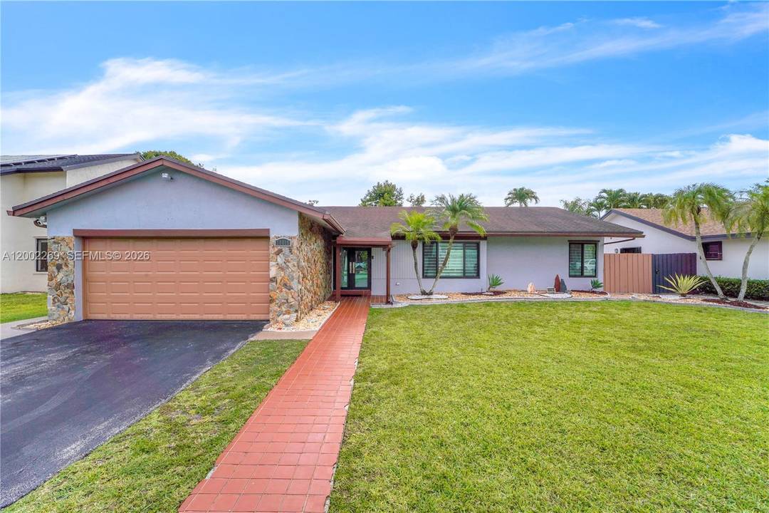 Welcome to 10615 SW 129 Ct, a beautifully updated 4 bedroom, 3 bathroom home in the heart of Calusa offering high ceilings, abundant natural light, and a clean, open feel ...