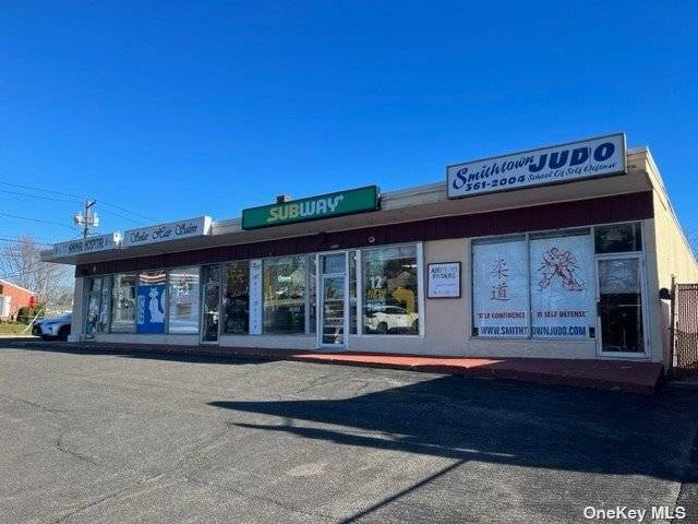 This is a free standing building at the prime location of Route 25A and St.